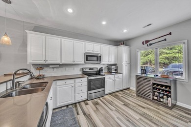Turn-key and beautifully remodeled, this entry-level end-unit - photo 30