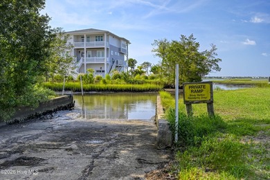 This lot in the charming coastal community of Snug Harbor - photo 3