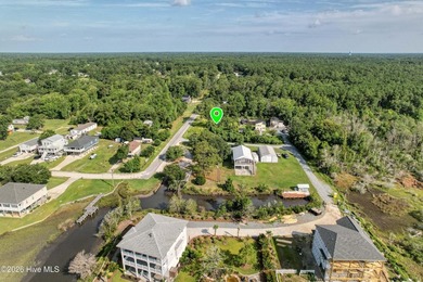 This lot in the charming coastal community of Snug Harbor - photo 5