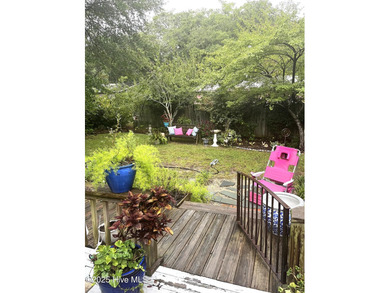 Nestled in Bonham Heights, known for its established, tree-lined