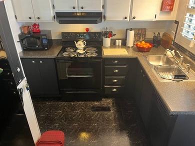This fully furnished 2 Bed/2 Bath on a corner lot offers a sense - photo 18