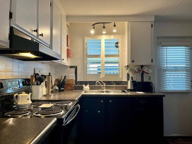 This fully furnished 2 Bed/2 Bath on a corner lot offers a sense - photo 20