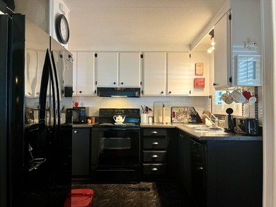 This fully furnished 2 Bed/2 Bath on a corner lot offers a sense - photo 21