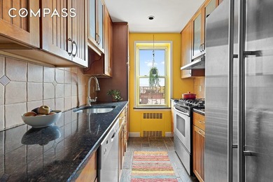 Perched on the top floor of a highly desirable coop that is set - photo 3
