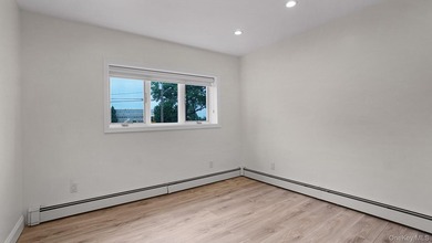 Welcome to this spacious Hi-Ranch in the heart of Bellmore - photo 14