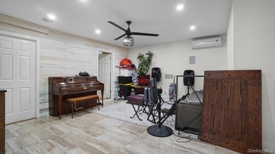 Welcome to this spacious Hi-Ranch in the heart of Bellmore - photo 16