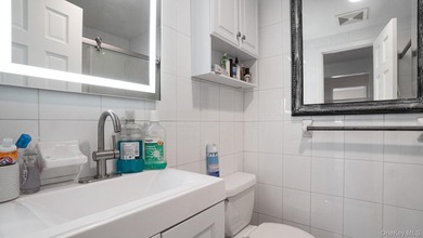 Welcome to this spacious Hi-Ranch in the heart of Bellmore - photo 18
