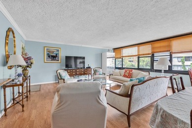 Bright and airy open concept layout with stunning wall of - photo 2