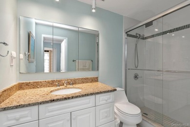 Bright and airy open concept layout with stunning wall of - photo 9