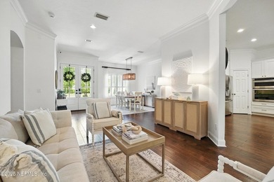 Nestled on a private 1.67-acre estate across from the - photo 11