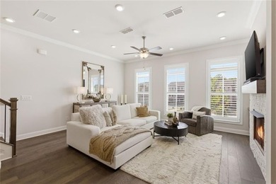 Elevated Living in Gated Waterside | Rare 3-Story Townhome with - photo 11