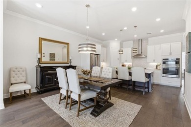 Elevated Living in Gated Waterside | Rare 3-Story Townhome with - photo 12