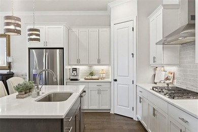 Elevated Living in Gated Waterside | Rare 3-Story Townhome with - photo 15