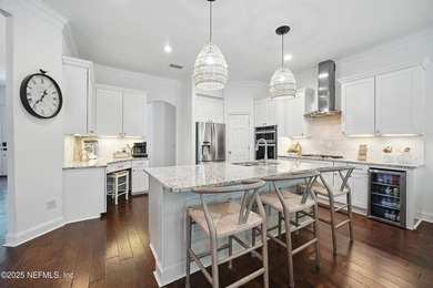 Nestled on a private 1.67-acre estate across from the - photo 16