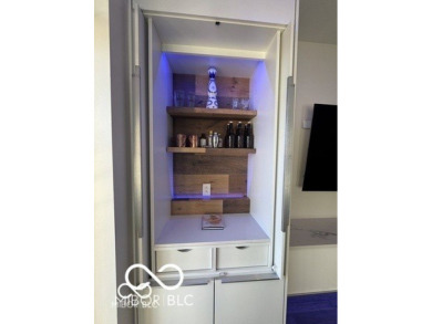 Welcome to a luxury smart home condo in Downtown Indianapolis