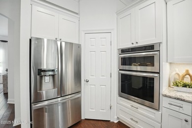 Nestled on a private 1.67-acre estate across from the - photo 18