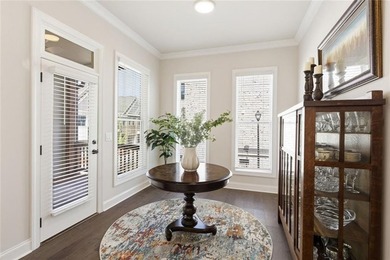 Elevated Living in Gated Waterside | Rare 3-Story Townhome with - photo 18