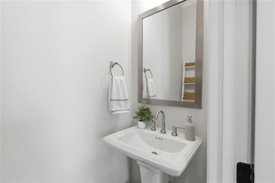 Elevated Living in Gated Waterside | Rare 3-Story Townhome with - photo 20