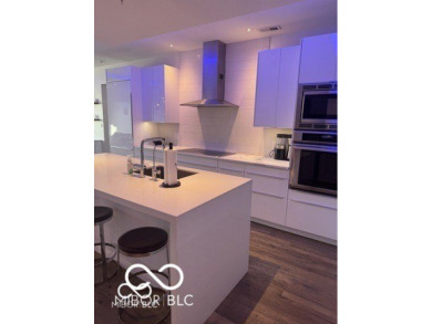Welcome to a luxury smart home condo in Downtown Indianapolis