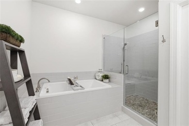 Elevated Living in Gated Waterside | Rare 3-Story Townhome with - photo 27