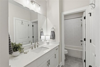 Elevated Living in Gated Waterside | Rare 3-Story Townhome with - photo 31