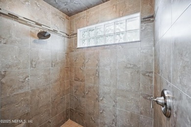 Nestled on a private 1.67-acre estate across from the - photo 32