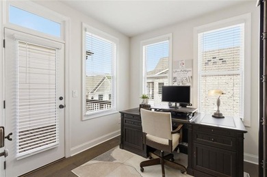 Elevated Living in Gated Waterside | Rare 3-Story Townhome with - photo 33