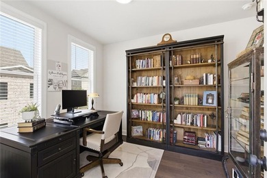 Elevated Living in Gated Waterside | Rare 3-Story Townhome with - photo 34