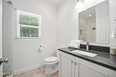 Nestled on a private 1.67-acre estate across from the - photo 35