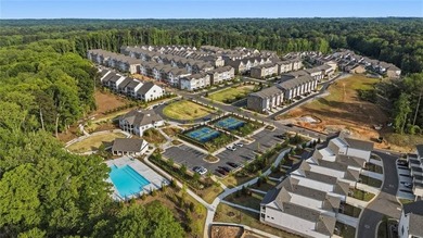 Elevated Living in Gated Waterside | Rare 3-Story Townhome with - photo 37