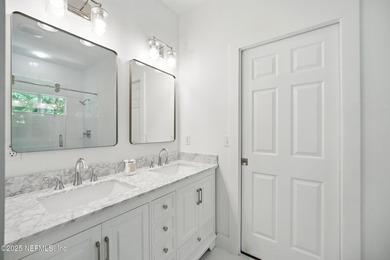 Nestled on a private 1.67-acre estate across from the - photo 39
