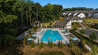 Elevated Living in Gated Waterside | Rare 3-Story Townhome with - photo 39