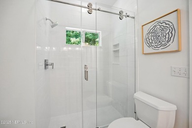 Nestled on a private 1.67-acre estate across from the - photo 41