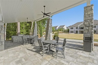 Elevated Living in Gated Waterside | Rare 3-Story Townhome with - photo 41