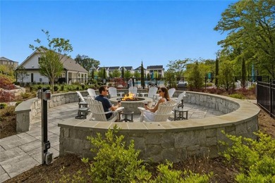 Elevated Living in Gated Waterside | Rare 3-Story Townhome with - photo 42