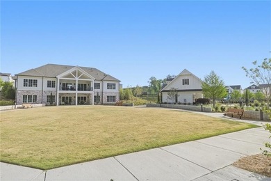 Elevated Living in Gated Waterside | Rare 3-Story Townhome with - photo 43