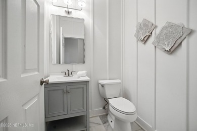 Nestled on a private 1.67-acre estate across from the - photo 44
