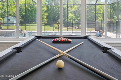 Nestled on a private 1.67-acre estate across from the - photo 47