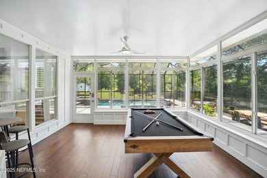 Nestled on a private 1.67-acre estate across from the - photo 48