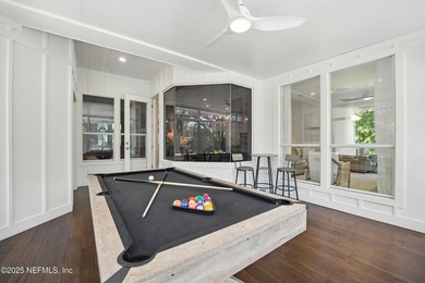 Nestled on a private 1.67-acre estate across from the - photo 49