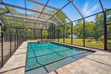 Nestled on a private 1.67-acre estate across from the - photo 53