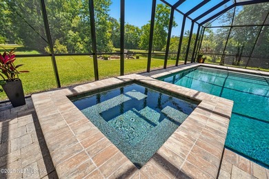 Nestled on a private 1.67-acre estate across from the - photo 55