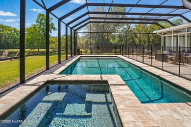 Nestled on a private 1.67-acre estate across from the - photo 56