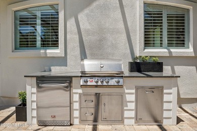 Nestled on a private 1.67-acre estate across from the - photo 57