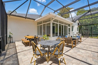 Nestled on a private 1.67-acre estate across from the - photo 60