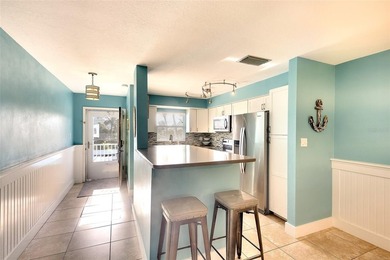 This beautifully updated 2BD/2BA coastal retreat offers the - photo 9