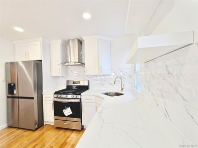 Beautifully renovated detached single-family home located in the - photo 11