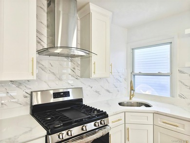Beautifully renovated detached single-family home located in the - photo 13