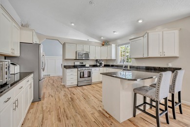 Situated in the sought-after South Ridge Fairways neighborhood