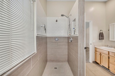 Situated in the sought-after South Ridge Fairways neighborhood